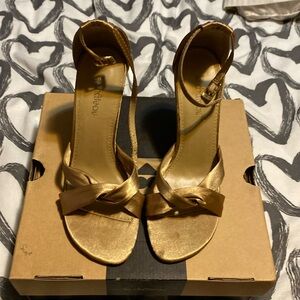 Gold satin shoes